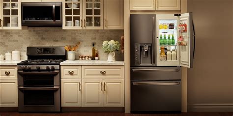 cream colored kitchen cabinets with stainless steel appliances|stainless steel kitchen cabinets colors.